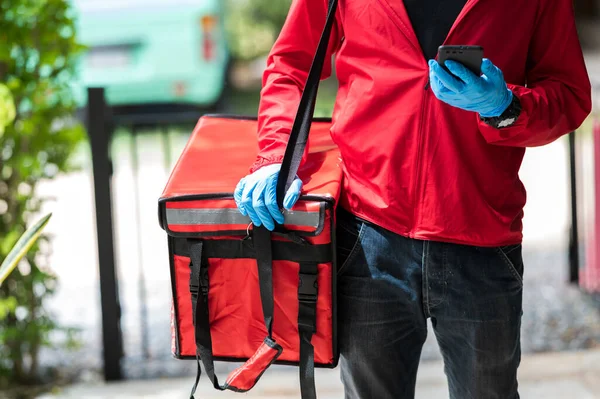 delivery man red cloth Searching for customer address by mobile phone