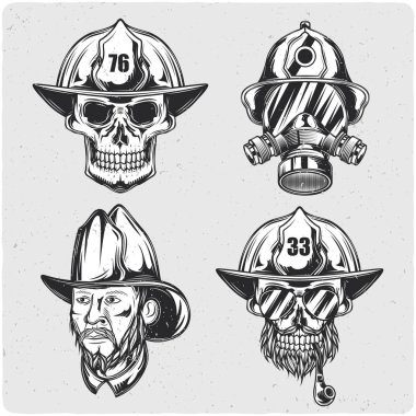 İtfaiyecinin kümesi başları. Siyah beyaz resim. Grunge gürültü ve çerçeve ile hafif backgrond izole.