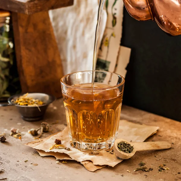 Pouring Herbal Tea Glass Variety Dried Herb Mixes Square — Stock Photo, Image