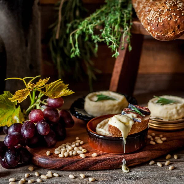 Soft Spreadable French Stinky Cheese Slice Bread Fruit Pine Nuts — Stock Photo, Image