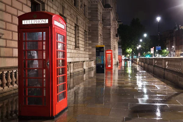 Popular tourist Red phone booth in night lights illumination in