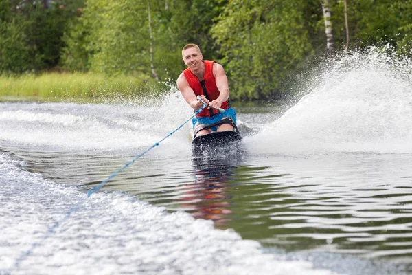 Young Athletic Man Riding Kneeboard Lake — Stock Photo, Image