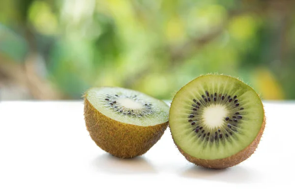 Kiwi fruit with cuts — Stock Photo, Image