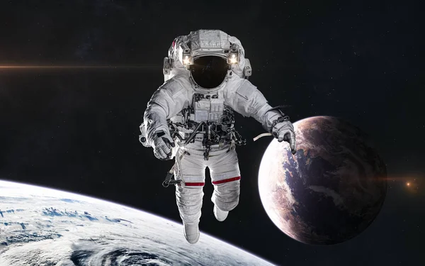 Astronaut i yttre rymden. Planeter i rymden — Stockfoto
