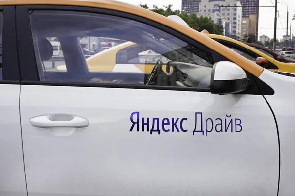 Yandex drive car sharing taxi on the street — Stock fotografie