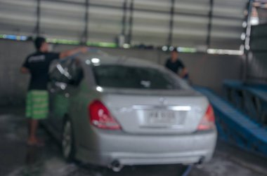 Oto yıkama hizmeti bu araç bakım bulanıklık. bir arka plan görüntüsü olarak kullanır.