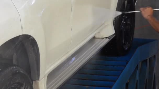 Carwash in Autowassen station. — Stockvideo