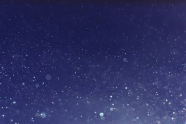 Renkli mavi bokeh efekti. Soyut doku ışığı yumuşak arkaplan.