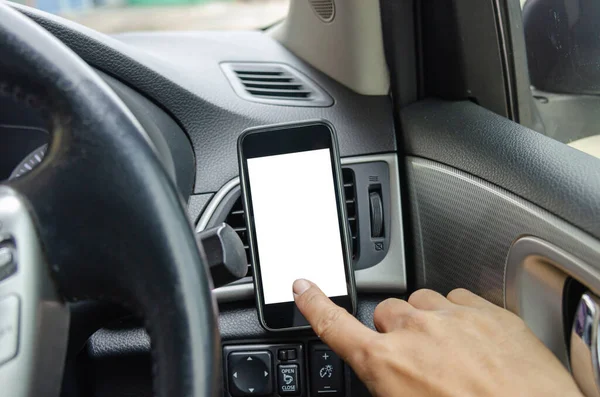 Man hand touch screen telephone in the car.Smartphone blank insert advertising or public relations. Clipping path smartphone screen