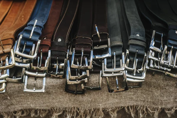 Leather man belts collection in the store.