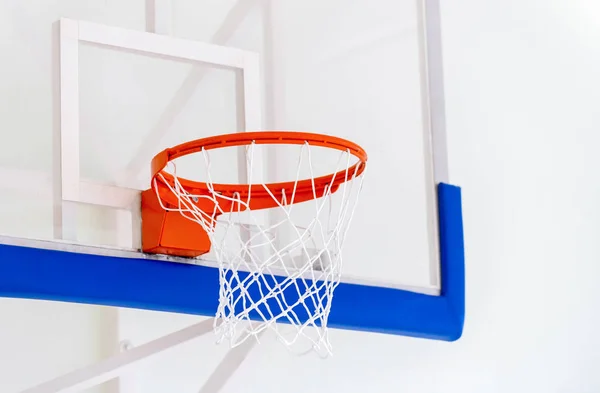 Basketball hoop cage, isolated large backboard closeup, new outdoor court set, blue, red, orange, white back board blank copy space background