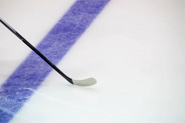 Hockey Stick a on the Ice Rink. Winter sport