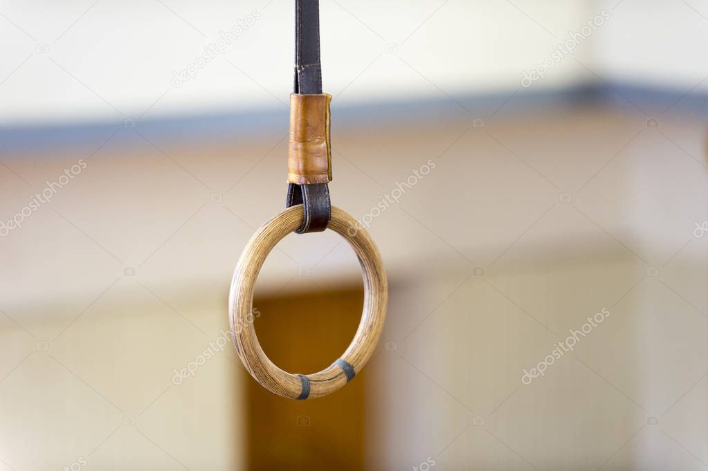 Gymnastic ring hanging in gym. healthy lifestyle and fitness concept