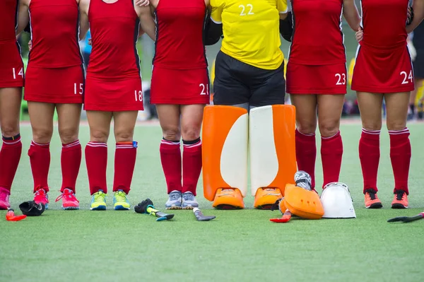 Woman field hockey team before the match. Training and field hockey tournament. Sports teams competition