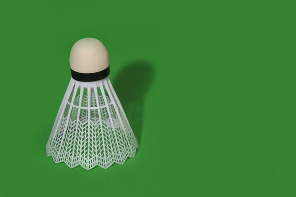 Badminton Shuttlecock Isolated Green Background — Stock Photo, Image