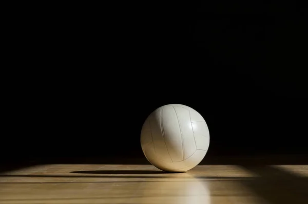 stock image Volleyball court wooden floor with ball isolated on black with copy-space