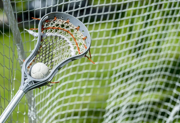 Absztrakt Kilátás Egy Lacrosse Stick Scooping Egy Labdát — Stock Fotó