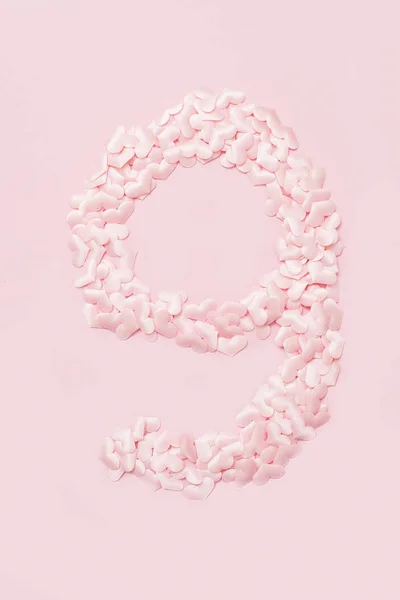Номер Дев Ять Зібраний Декоративних Рожевих Сердець Ізольовані Рожевому Фоні — стокове фото