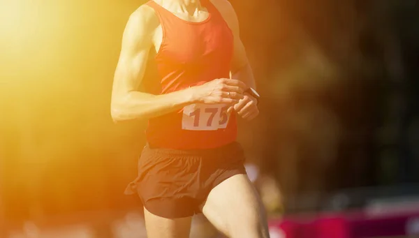 Athletics man running on the track field — Stock Photo, Image