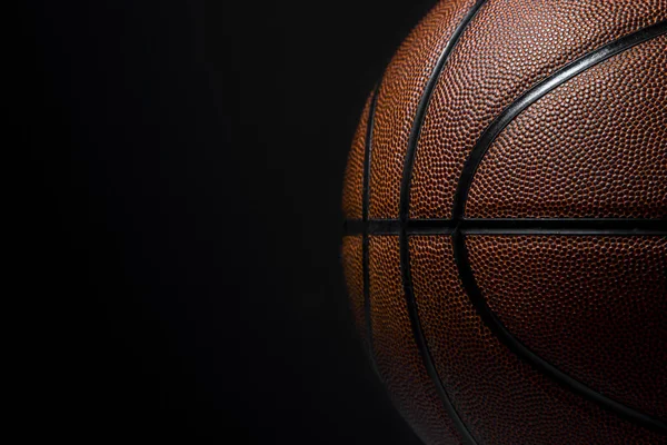 Closeup detail of basketball ball texture background