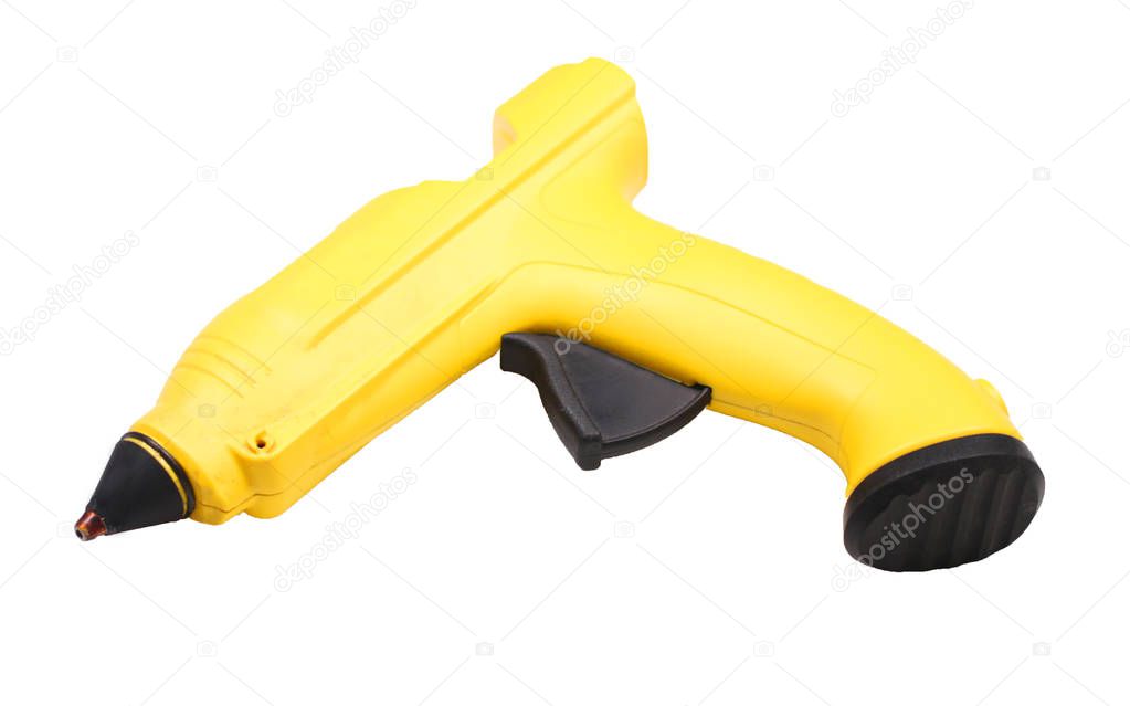 Yellow wireless hot glue gun isolated