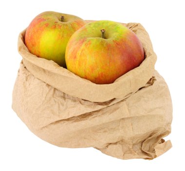 Fresh apples in an environmentally friendly brown paper bag isolated on a white background clipart