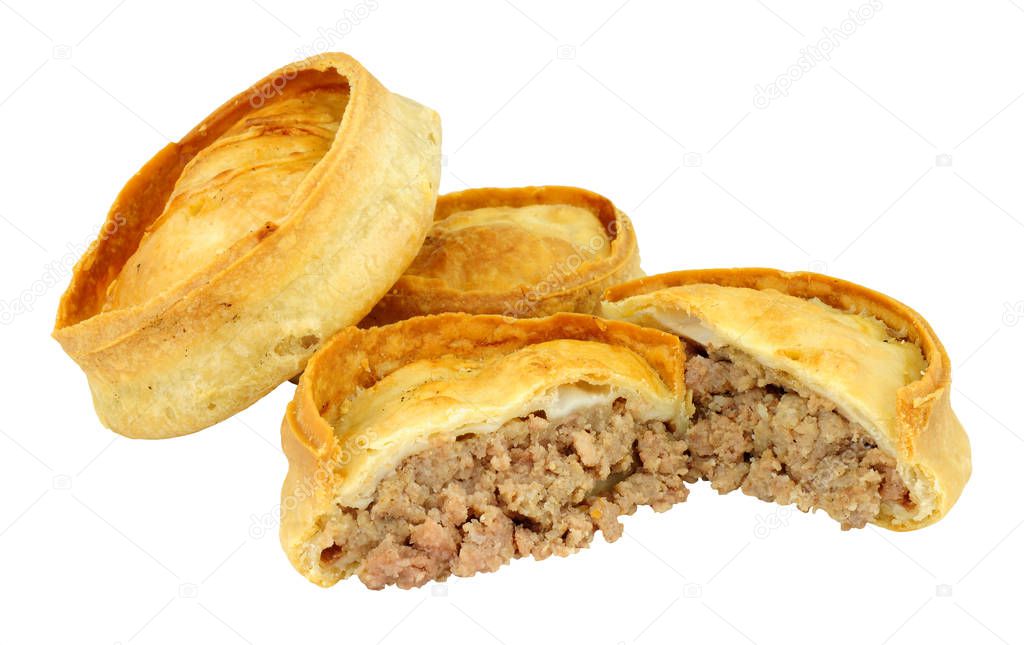 Traditional Scotch meat pies isolated on a white background