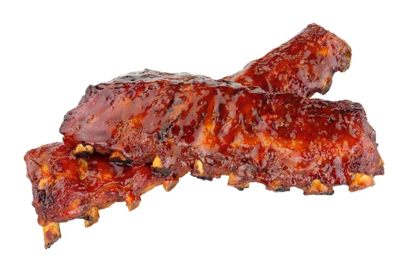 Chinese Peking style pork ribs coated with sticky plum sauce glaze isolated on a white background