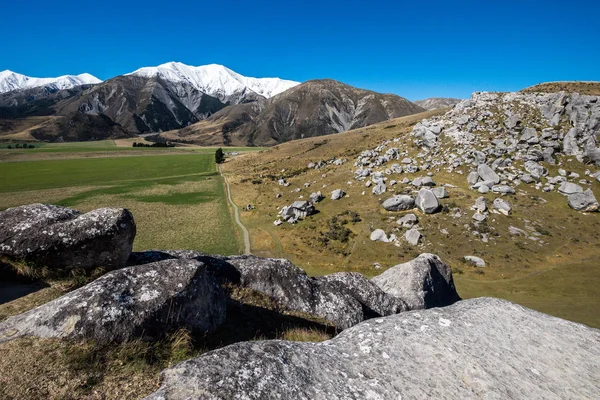 Scenic View around Castle Hill with Castle Hill Peak in the Background Locate in South Island of New Zealand