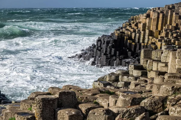 Landscape around Giant\'s Causeway, A UNESCO world heritage site which has numbers of interlocking basalt columns result of an ancient volcanic fissure eruption.It is located in County Antrim on the north coast of Northern Ireland, United Kingdom.