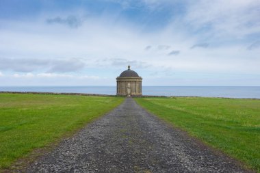 Mussenden Temple, located in the beautiful surroundings of Downhill Demesne near Castlerock in County Londonderry, Northern Ireland clipart