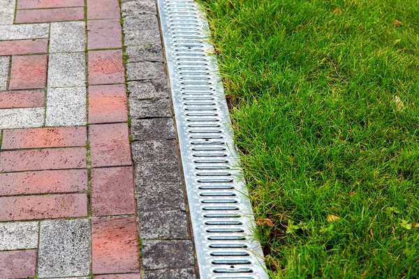 Iron Gutter Grate Drainage System Side Walkway Green Lawn Close — Stock Photo, Image