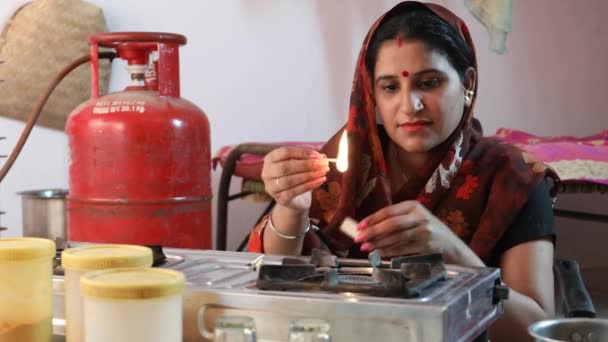 Lower Middle Class Woman Lighting Her New Gas Stove Feeling — Stock Video
