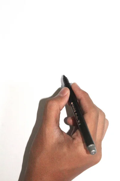 El izole beyaz arka plan üzerinde siyah kalemle yazma.