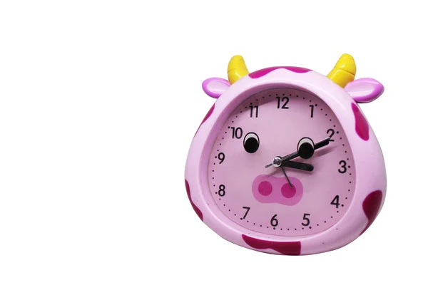 Sevimli pembe çalar saat. Beyaz arka planda kızlar için çalar saat