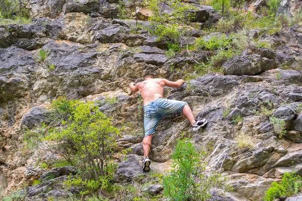 Young Boy Climber Jeans Shirts Bare Torso Climbs Rocks Top Royalty Free Stock Photos