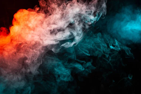 Premium Photo | Color fume. creative background. paint in water.  ultraviolet mystic air. glowing vibrant neon blue magenta pink fog  spreading on dark.
