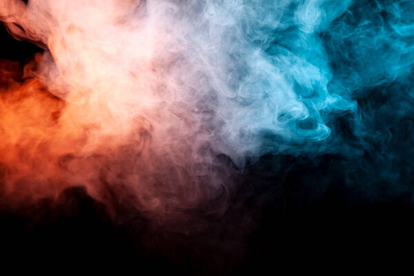 Background of orange, purple, red and blue wavy smoke on a black isolated ground. Abstract pattern of steam from vape of smoothly rising clubs. Mocap and print for t-shirt.