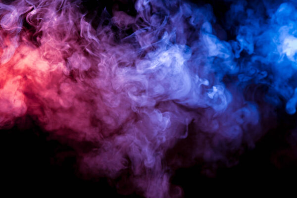 Beautiful horizontal column of smoke in the neon bright light of blue pink and orange on a black background exhaled out of the vape, mocap and print for t-shirt.