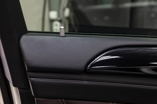 A close-up view of a part of the interior of a modern luxury car