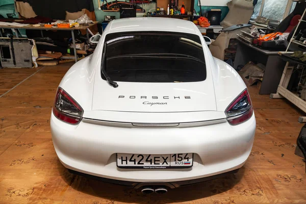 Rear view of luxury very expensive new white Porsche Cayman coup — Stock Photo, Image