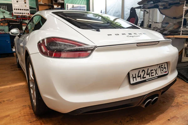 Rear view of luxury very expensive new white Porsche Cayman coup — Stock Photo, Image