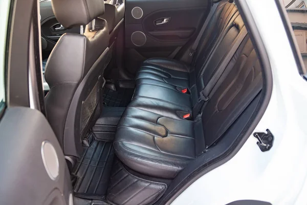 Clean after washing the rear passenger seats of matte black genu — Stock Photo, Image