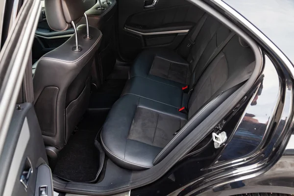 The interior of the car with a view of the rear seats with light — Stock Photo, Image