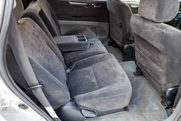 Close-up on rear seats with velours fabric upholstery in the int — Stock Photo, Image