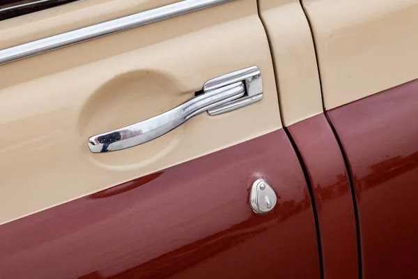 View on closed rear door with handle and corner wondow of the ol — Stock Photo, Image