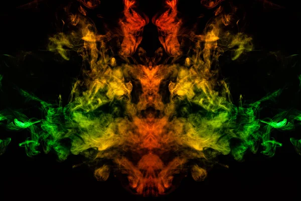 Smoke of different green, yellow, orange and red colors in the f