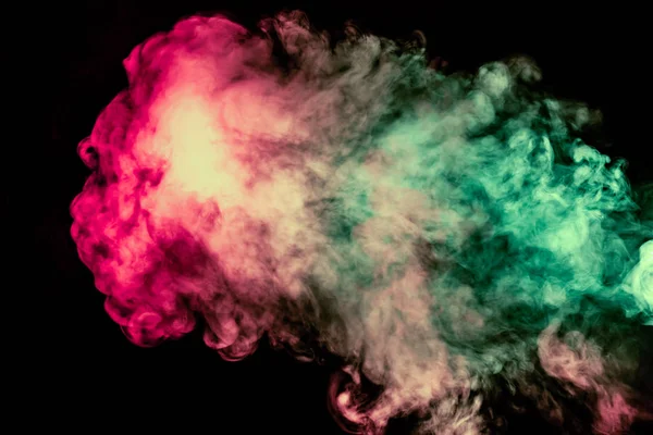 Beautiful column of smoke in the neon bright light of red, green