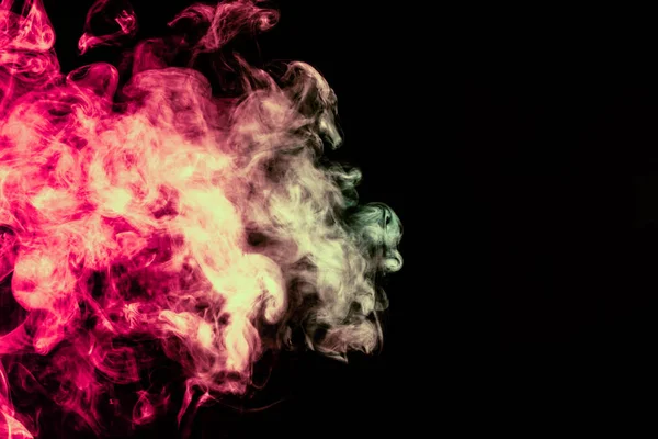 Beautiful column of smoke in the neon bright light of red, green