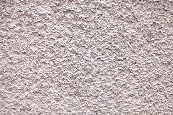 Background from a rough concrete wall with gray and beige pimple — Stock Photo, Image
